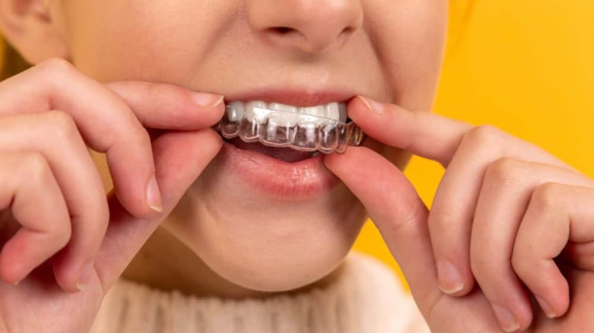 Why might your dentist recommend Invisalign treatment for aligning your teeth?